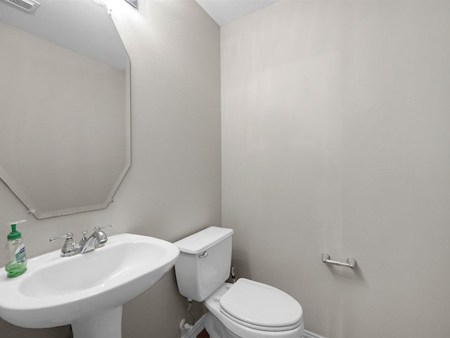14402 Cottage Timbers Ln, Houston, TX 77044 - half bath with a sink and toilet