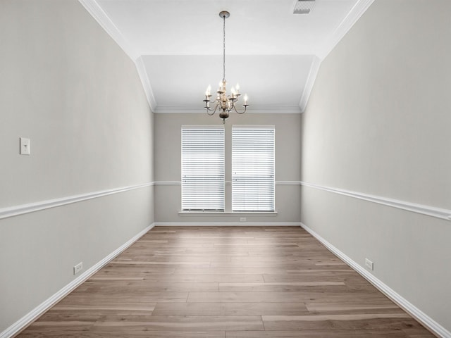 14402 Cottage Timbers Ln, Houston, TX 77044 - spare room featuring ornamental molding, a chandelier, wood finished floors, and baseboards