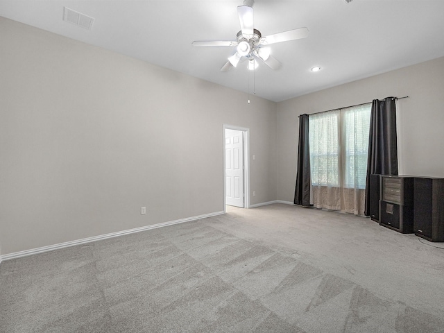 14402 Cottage Timbers Ln, Houston, TX 77044 - spare room with carpet flooring, a ceiling fan, and baseboards