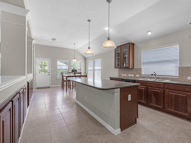 14402 Cottage Timbers Ln, Houston, TX 77044 - kitchen with a sink, tasteful backsplash, light tile patterned floors, glass insert cabinets, and vaulted ceiling