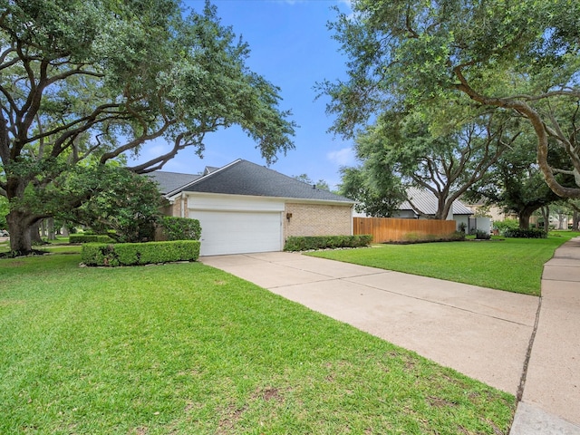 1735 Hodge Lake Ln, Sugar Land, TX 77478 - view of side of property featuring an attached garage, brick siding, and driveway