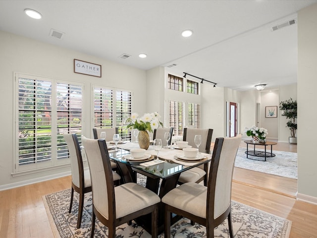 1735 Hodge Lake Ln, Sugar Land, TX 77478 - dining area with light wood-type flooring, baseboards, and recessed lighting