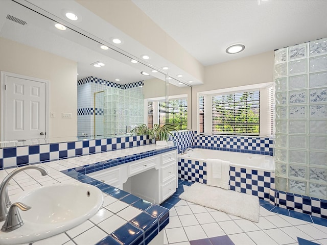 1735 Hodge Lake Ln, Sugar Land, TX 77478 - full bath with double vanity, a garden tub, recessed lighting, tiled shower, and backsplash