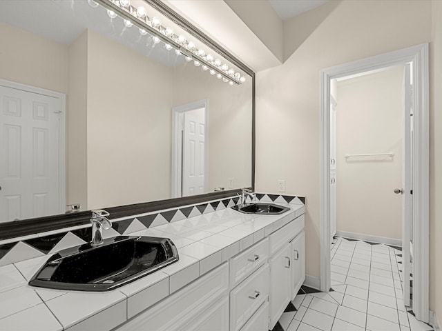 1735 Hodge Lake Ln, Sugar Land, TX 77478 - bathroom with double vanity and tile patterned floors