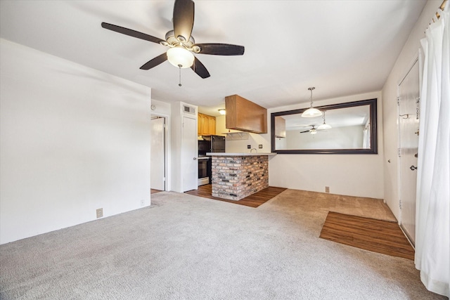 1849 Marshall St Unit 1, Houston, TX 77098 - unfurnished living room with a ceiling fan and carpet floors