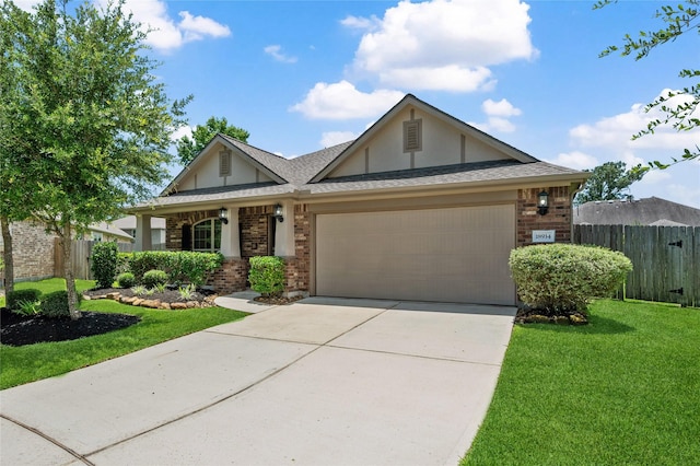 18934 Sorrento Point Dr, New Caney, TX 77357 - view of front facade with brick siding, a garage, concrete driveway, and a shingled roof