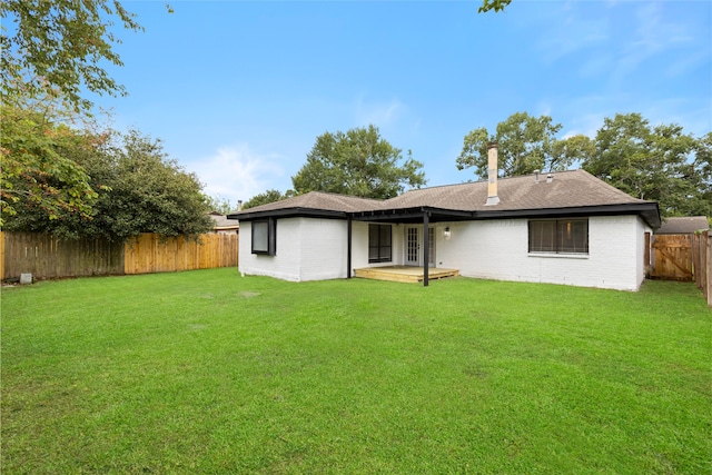 2314 Peaceful Valley Dr, Spring, TX 77373 - back of property featuring brick siding and roof with shingles