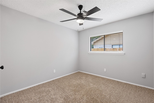2314 Peaceful Valley Dr, Spring, TX 77373 - empty room featuring carpet, baseboards, a ceiling fan, and a textured ceiling