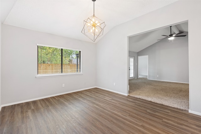 2314 Peaceful Valley Dr, Spring, TX 77373 - empty room with lofted ceiling, baseboards, wood finished floors, a ceiling fan, and a chandelier