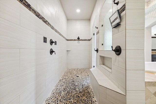 10306 Grape Creek Grove Ln, Cypress, TX 77433 - bathroom with a tile shower and recessed lighting
