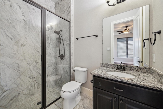 10306 Grape Creek Grove Ln, Cypress, TX 77433 - full bath with a stall shower, toilet, vanity, marble look tile flooring, and a ceiling fan