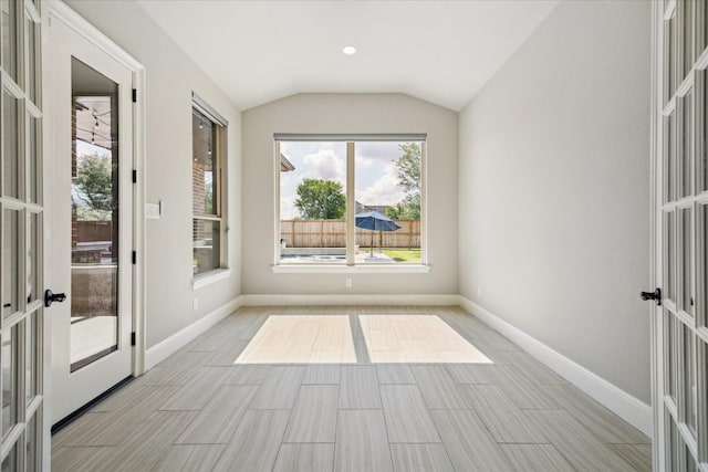 10306 Grape Creek Grove Ln, Cypress, TX 77433 - unfurnished room with vaulted ceiling, french doors, and baseboards