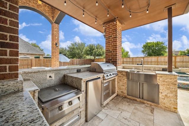 10306 Grape Creek Grove Ln, Cypress, TX 77433 - fenced backyard with a patio area and a sink