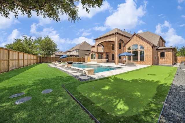 10306 Grape Creek Grove Ln, Cypress, TX 77433 - view of pool featuring an area to practice putting and a patio