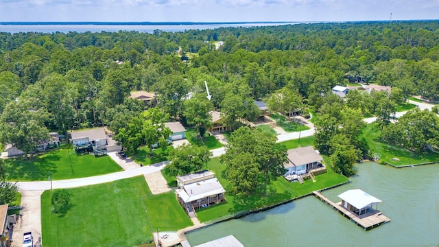 311 Harbor Dr, Onalaska, TX 77360 - aerial overview of property's location with a heavily wooded area, a nearby body of water, and nearby suburban area