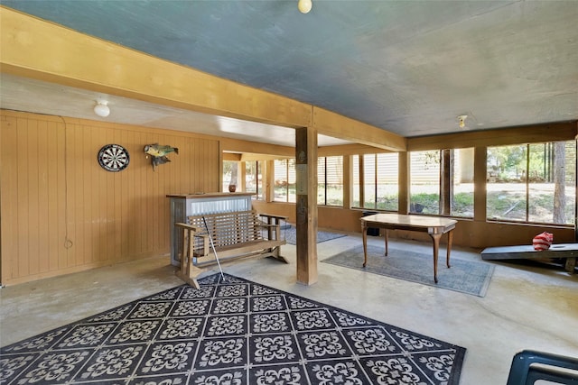 311 Harbor Dr, Onalaska, TX 77360 - rec room featuring concrete floors and wood walls