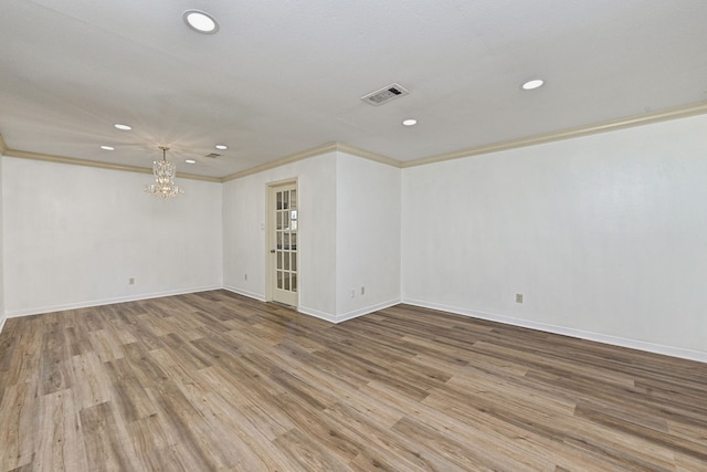 8007 Twin Hills Dr, Houston, TX 77071 - unfurnished room with recessed lighting, a chandelier, crown molding, baseboards, and wood finished floors