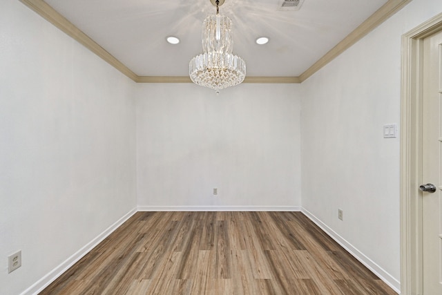 8007 Twin Hills Dr, Houston, TX 77071 - empty room featuring a chandelier, crown molding, wood finished floors, and baseboards