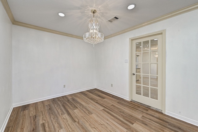 8007 Twin Hills Dr, Houston, TX 77071 - spare room featuring a chandelier, ornamental molding, wood finished floors, baseboards, and recessed lighting