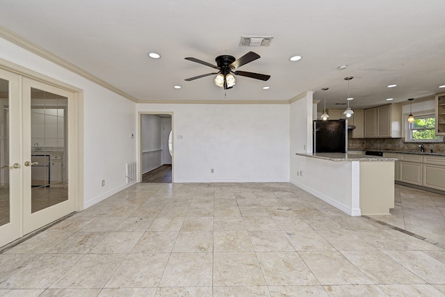 8007 Twin Hills Dr, Houston, TX 77071 - unfurnished living room with french doors, recessed lighting, ceiling fan, ornamental molding, and baseboards