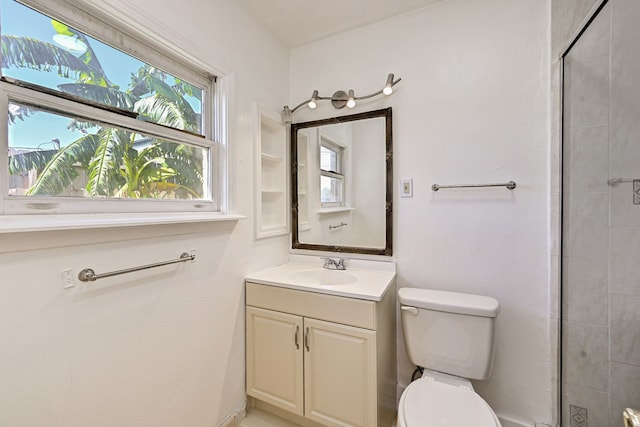 8007 Twin Hills Dr, Houston, TX 77071 - bathroom featuring toilet, vanity, and tiled shower