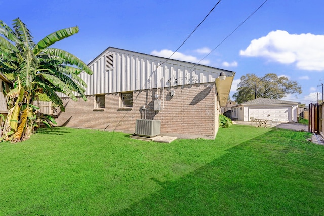 8007 Twin Hills Dr, Houston, TX 77071 - back of property with brick siding, central AC, and a garage