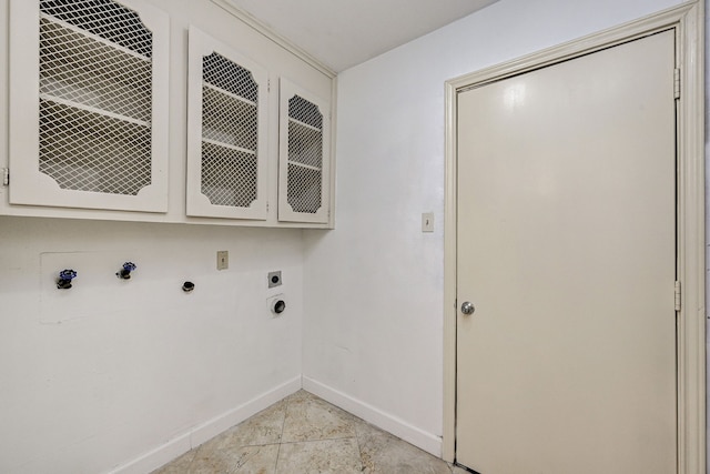 8007 Twin Hills Dr, Houston, TX 77071 - washroom featuring cabinet space, baseboards, and electric dryer hookup