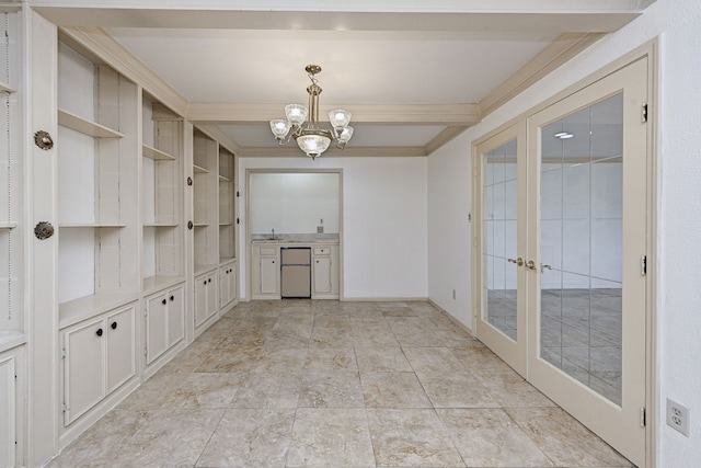 8007 Twin Hills Dr, Houston, TX 77071 - unfurnished dining area with french doors, a chandelier, beamed ceiling, crown molding, and a sink