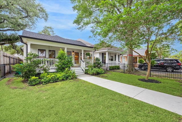 1336 Tulane St, Houston, TX 77008 - view of front facade with a porch and roof with shingles