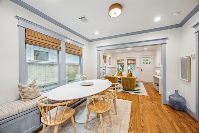 1336 Tulane St, Houston, TX 77008 - dining area featuring ornamental molding, light wood-style floors, and recessed lighting