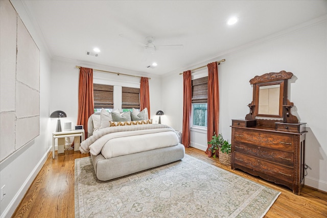 1336 Tulane St, Houston, TX 77008 - bedroom featuring wood finished floors, crown molding, recessed lighting, baseboards, and ceiling fan
