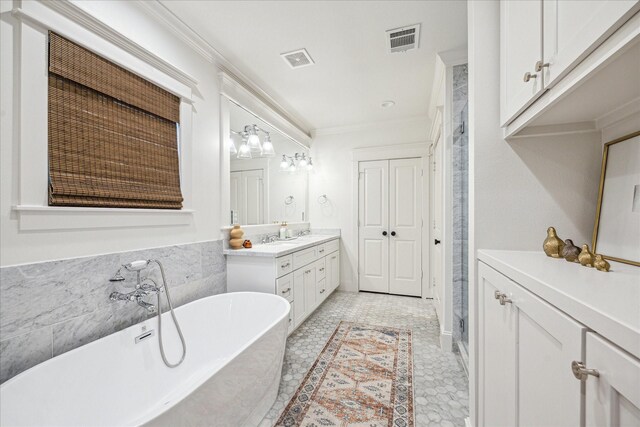1336 Tulane St, Houston, TX 77008 - full bath with vanity, a soaking tub, and ornamental molding