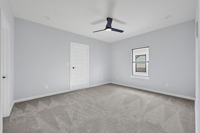 90 Burres St Unit B, Houston, TX 77022 - spare room featuring ceiling fan, baseboards, and carpet floors