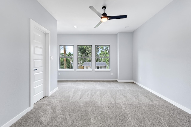 90 Burres St Unit B, Houston, TX 77022 - carpeted spare room featuring baseboards and ceiling fan