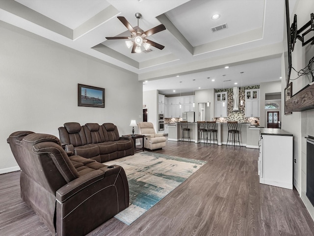3466 Oakheath Manor Way, Houston, TX 77365 - living room featuring ceiling fan, dark wood-type flooring, coffered ceiling, recessed lighting, and beamed ceiling
