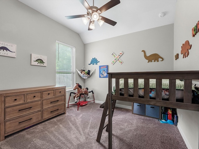 3466 Oakheath Manor Way, Houston, TX 77365 - carpeted bedroom with lofted ceiling, baseboards, and a ceiling fan