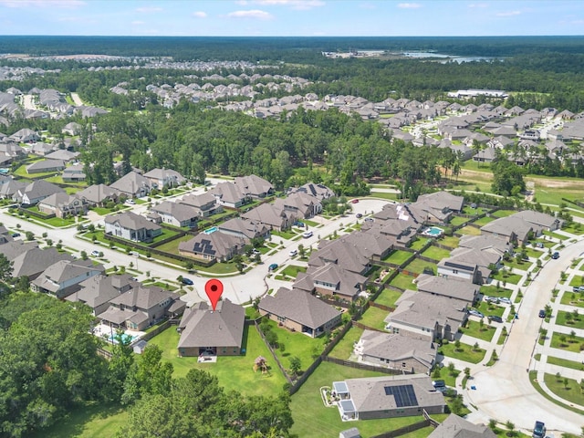 3466 Oakheath Manor Way, Houston, TX 77365 - aerial overview of property's location featuring nearby suburban area and a heavily wooded area