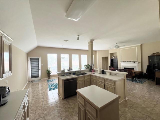 11 Crestview Trl, Houston, TX 77082 - kitchen with dishwashing machine, a sink, a tile fireplace, open floor plan, and light countertops