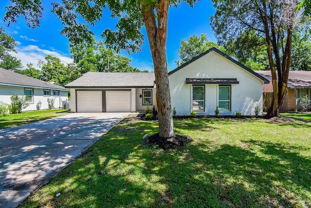 5906 Melanite Ave, Houston, TX 77053 - view of front of home featuring an attached garage, brick siding, and concrete driveway