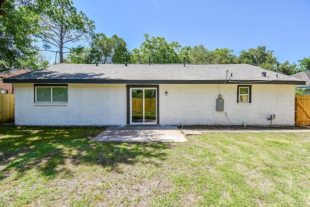 5906 Melanite Ave, Houston, TX 77053 - back of house featuring a patio area, brick siding, and roof with shingles