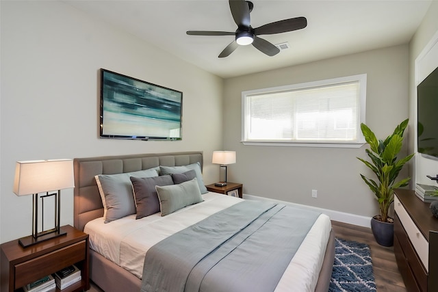 5906 Melanite Ave, Houston, TX 77053 - bedroom featuring wood finished floors, baseboards, and a ceiling fan