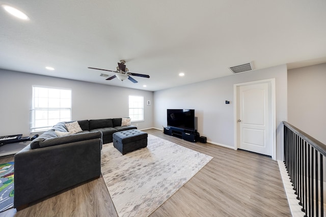 8106 Sweetstone Bluff Ln, Cypress, TX 77433 - living area with wood finished floors, a ceiling fan, recessed lighting, and baseboards