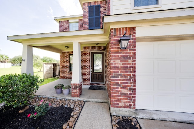 8106 Sweetstone Bluff Ln, Cypress, TX 77433 - doorway to property featuring brick siding and a porch