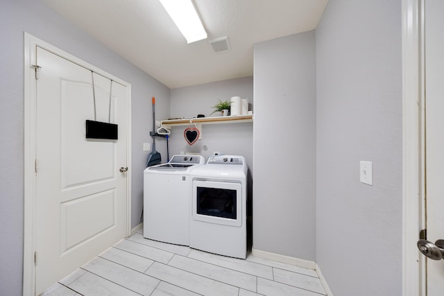 8106 Sweetstone Bluff Ln, Cypress, TX 77433 - laundry room with washing machine and clothes dryer and baseboards