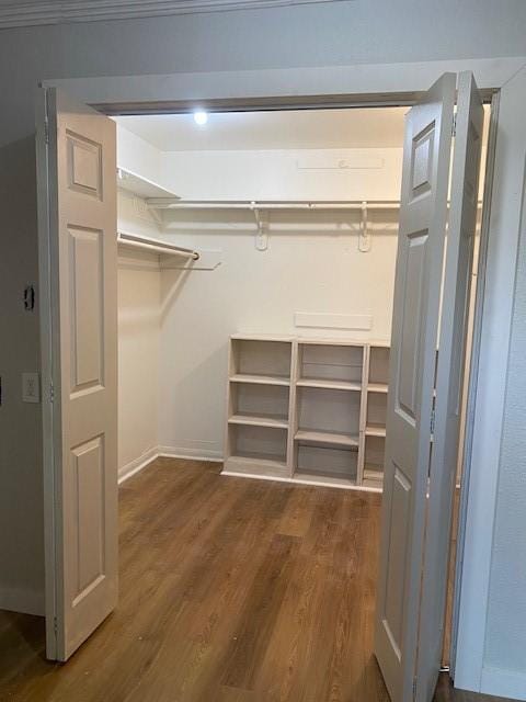 8107 S Braeswood Blvd, Houston, TX 77071 - spacious closet featuring dark wood finished floors