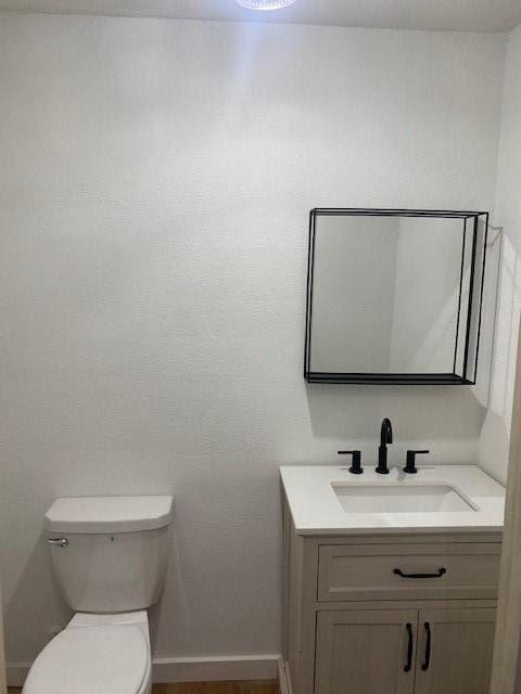 8107 S Braeswood Blvd, Houston, TX 77071 - bathroom with vanity and toilet