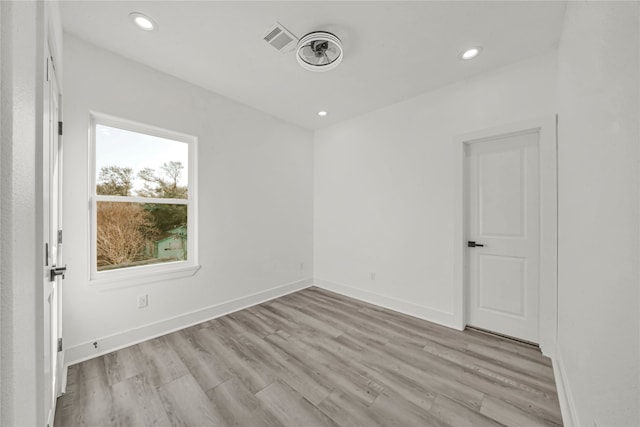 4404 Bond St, Houston, TX 77026 - spare room featuring light wood-style floors, recessed lighting, and baseboards