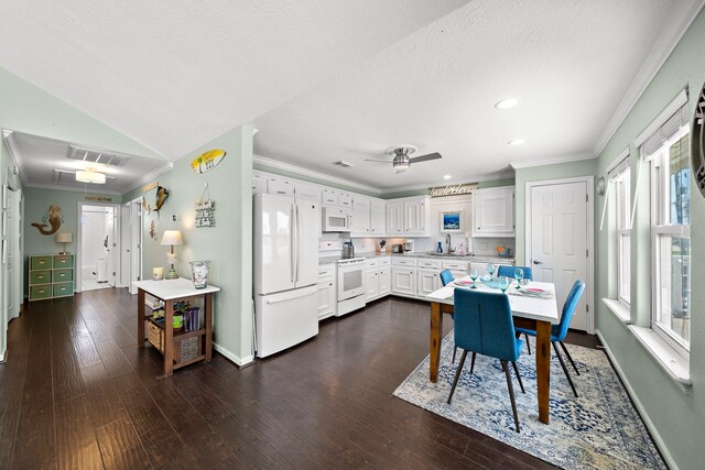 22321 Vista Del Mar, Galveston, TX 77554 - dining space with ornamental molding, ceiling fan, dark wood-style flooring, baseboards, and recessed lighting