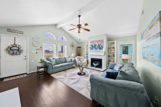 22321 Vista Del Mar, Galveston, TX 77554 - living room with a ceiling fan, wood-type flooring, and a tiled fireplace