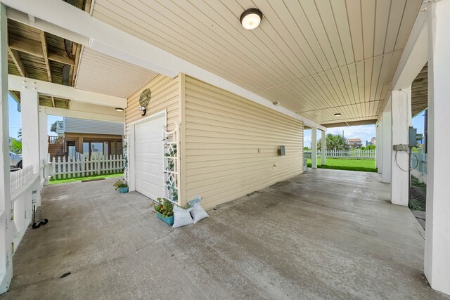 22321 Vista Del Mar, Galveston, TX 77554 - view of patio / terrace with a garage